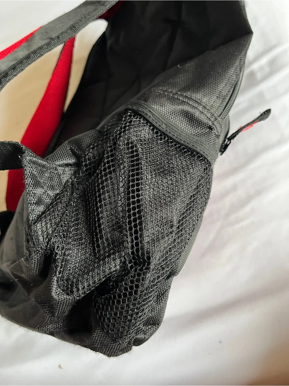 Black & Red Multi-Pocket Backpack with Media Port & Mesh Side Pockets